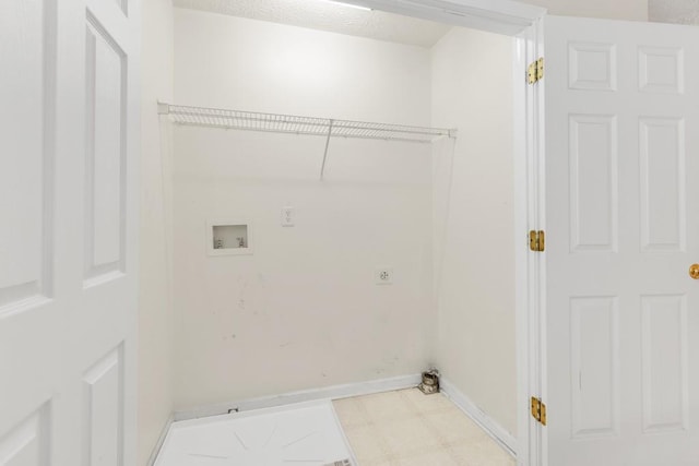 1186 Hawthorn Ln, Grayson, GA 30017 - laundry room with washer hookup, baseboards, electric dryer hookup, and tile patterned floors