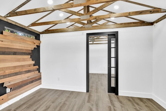 1186 Hawthorn Ln, Grayson, GA 30017 - spare room featuring baseboards and wood finished floors
