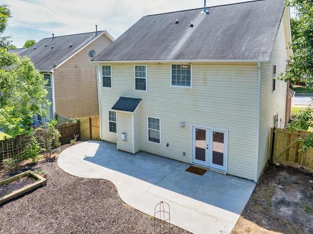 1186 Hawthorn Ln, Grayson, GA 30017 - back of house with a patio area, a fenced backyard, and roof with shingles