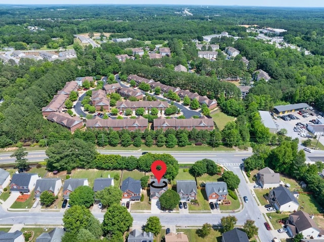 1186 Hawthorn Ln, Grayson, GA 30017 - aerial view of property and surrounding area featuring nearby suburban area and a heavily wooded area