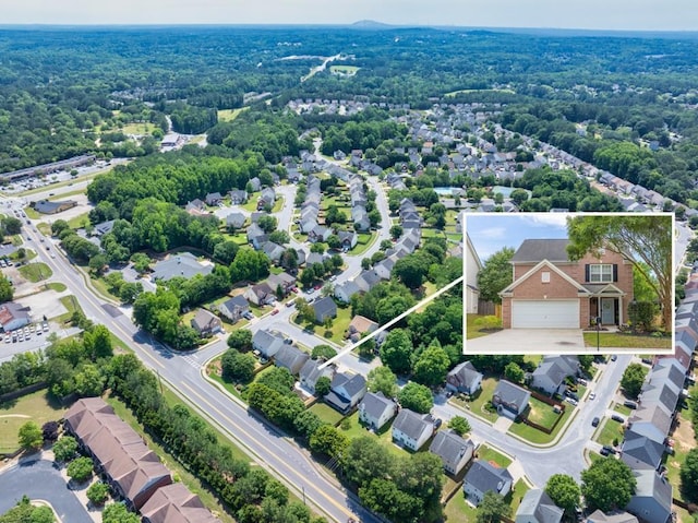 1186 Hawthorn Ln, Grayson, GA 30017 - aerial view of residential area featuring property parcel outlined and a heavily wooded area