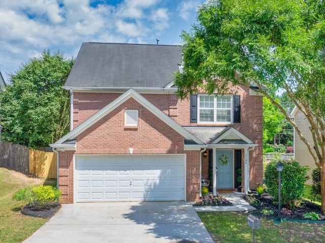 1186 Hawthorn Ln, Grayson, GA 30017 - traditional home with driveway and brick siding