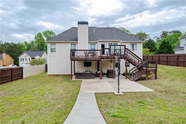 rear view of house featuring outdoor lounge area, a wooden deck, a fenced backyard, and stairs