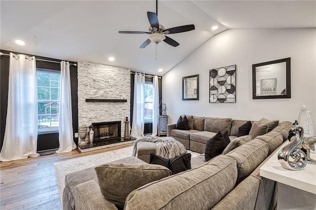 living room featuring recessed lighting, ceiling fan, wood finished floors, and lofted ceiling