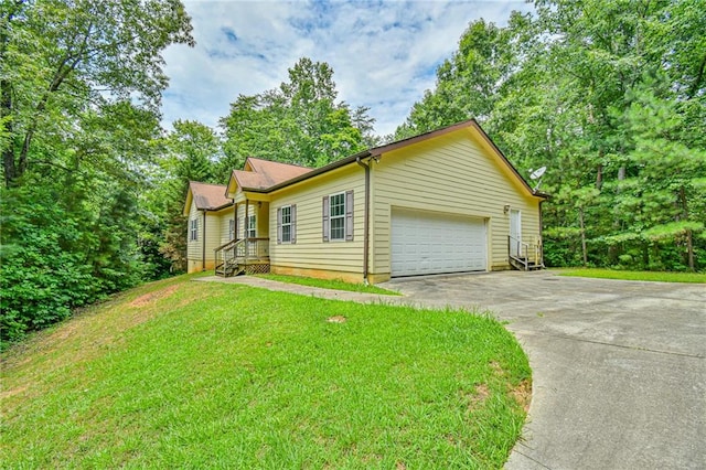 view of property exterior featuring a garage and a lawn