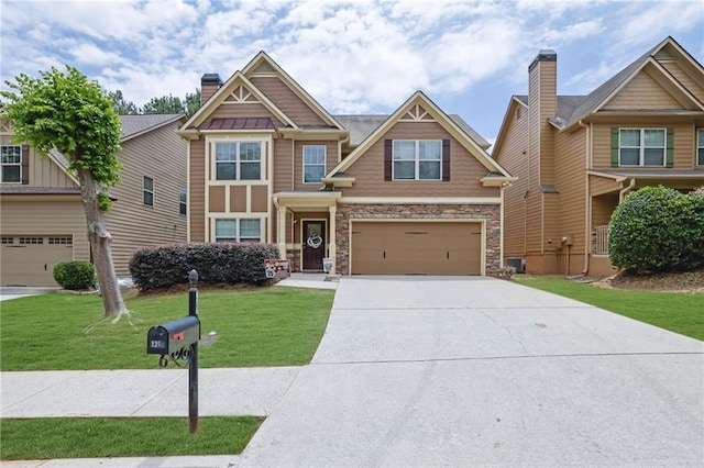 1267 Castleberry Dr, Buford, GA 30518 - craftsman inspired home featuring concrete driveway, a front lawn, stone siding, and a garage