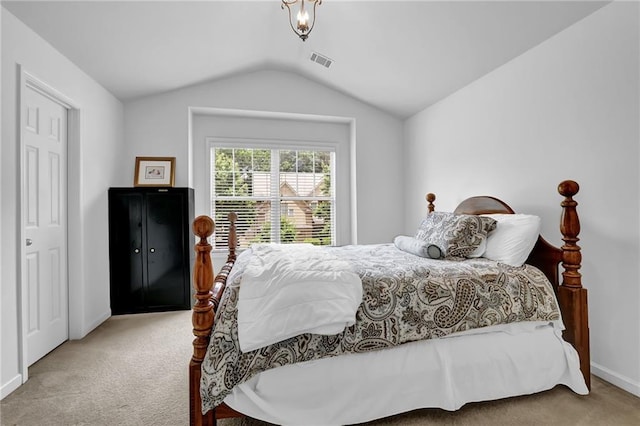 1267 Castleberry Dr, Buford, GA 30518 - carpeted bedroom featuring lofted ceiling and baseboards