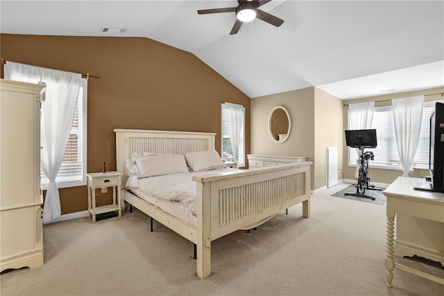 1267 Castleberry Dr, Buford, GA 30518 - bedroom with vaulted ceiling, light carpet, baseboards, and a ceiling fan