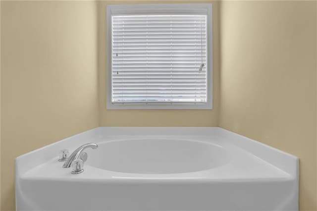 1267 Castleberry Dr, Buford, GA 30518 - full bathroom with a garden tub