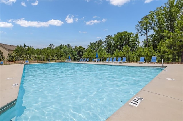 1267 Castleberry Dr, Buford, GA 30518 - community pool with a patio area