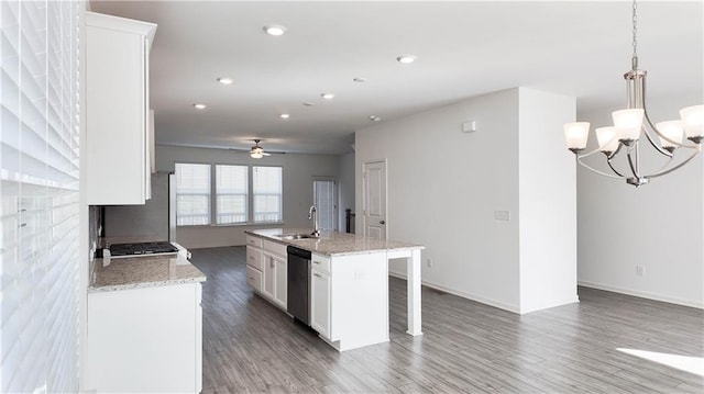 kitchen featuring dishwasher, pendant lighting, a center island with sink, white cabinetry, and ceiling fan with notable chandelier