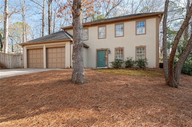 view of front of property featuring a garage