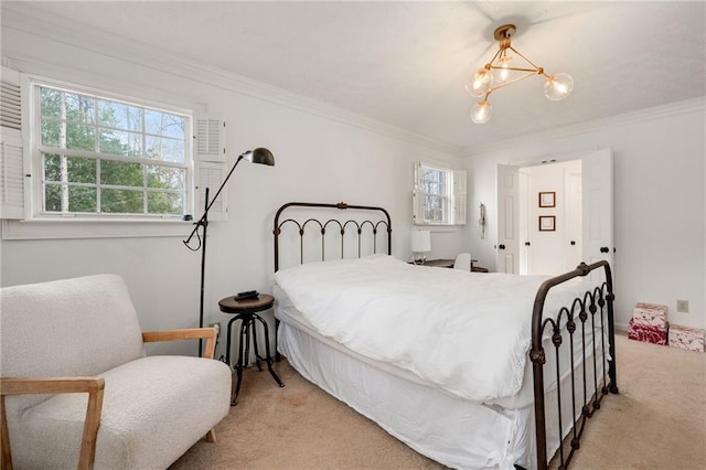 bedroom with ornamental molding and light carpet