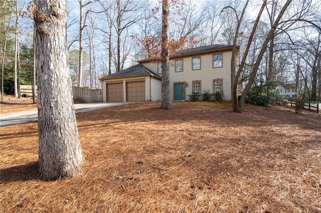 view of front of home with a garage