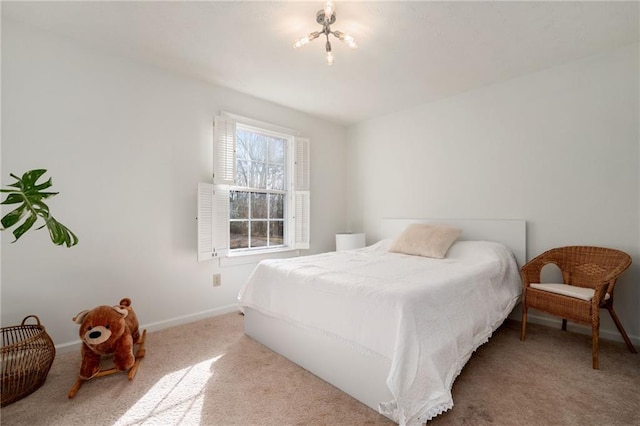 bedroom featuring light carpet