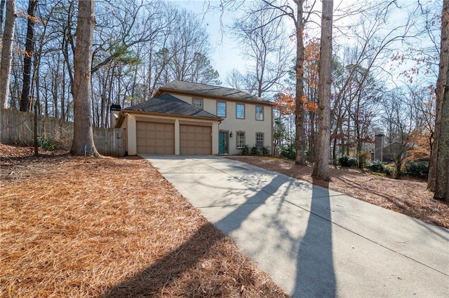 view of front of home with a garage