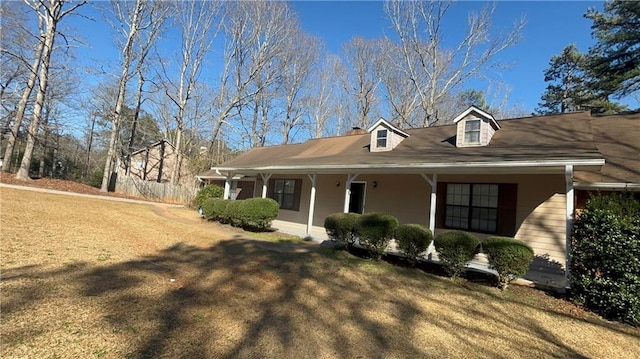 440 Ward Rd, Ellenwood, GA 30294 - view of front of house with covered porch and a front lawn