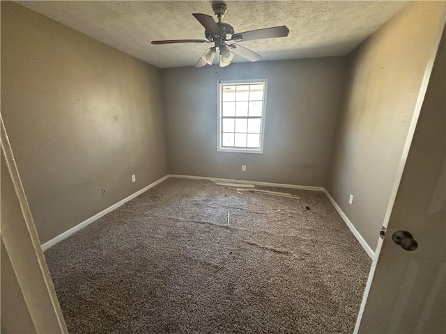 440 Ward Rd, Ellenwood, GA 30294 - carpeted spare room featuring a textured ceiling, baseboards, and ceiling fan
