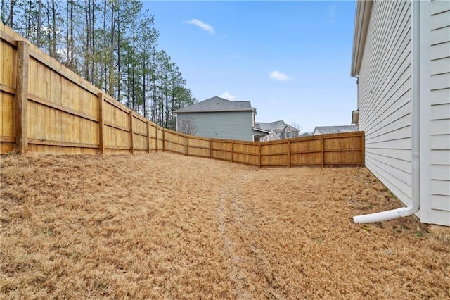 view of yard featuring a fenced backyard