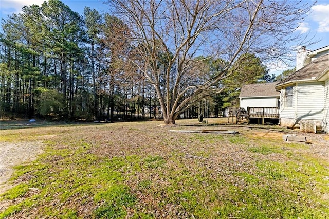 view of yard featuring a deck