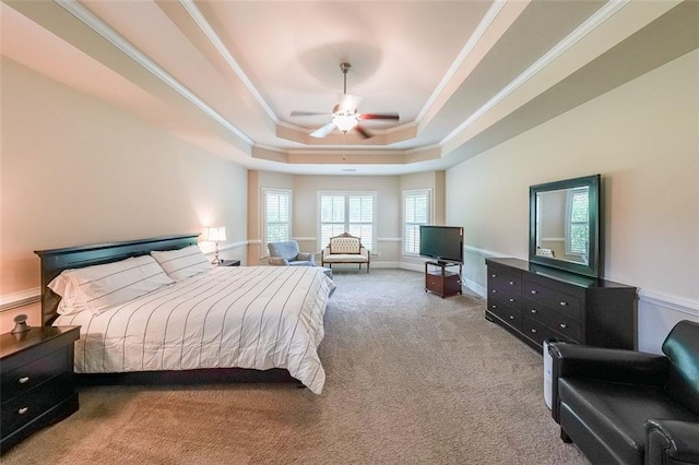265 Enfield Ln, Mcdonough, GA 30252 - carpeted bedroom featuring a raised ceiling, crown molding, and a ceiling fan