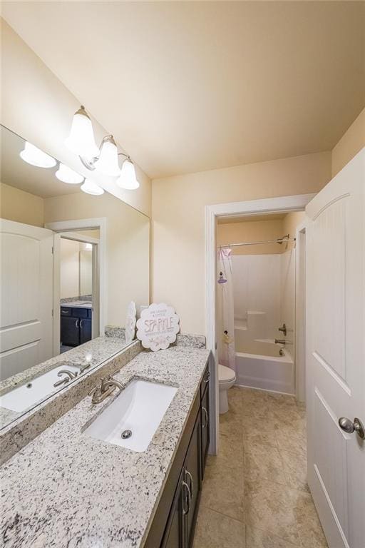 265 Enfield Ln, Mcdonough, GA 30252 - bathroom featuring vanity, toilet, shower / bath combo with shower curtain, and tile patterned floors
