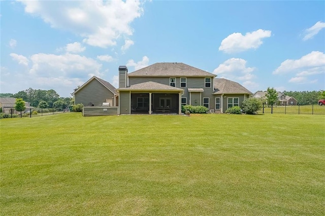 265 Enfield Ln, Mcdonough, GA 30252 - rear view of house featuring a sunroom and a chimney