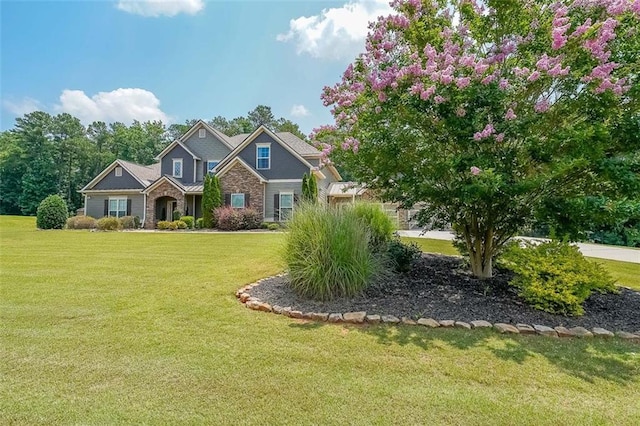 265 Enfield Ln, Mcdonough, GA 30252 - craftsman house featuring a front lawn and stone siding