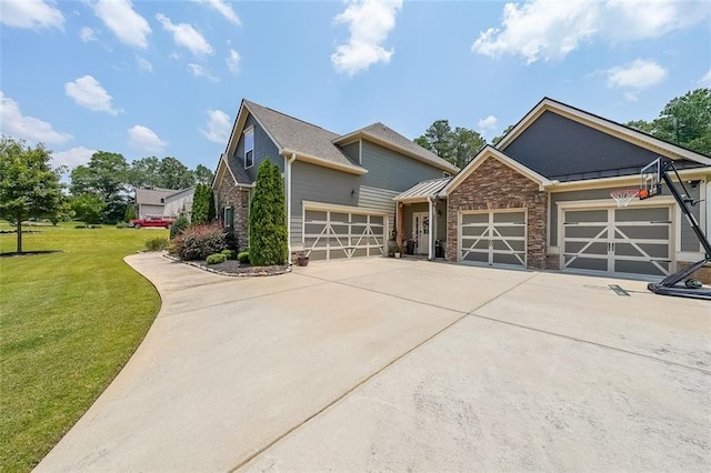 265 Enfield Ln, Mcdonough, GA 30252 - view of front of property featuring an attached garage, a front lawn, driveway, stone siding, and a standing seam roof