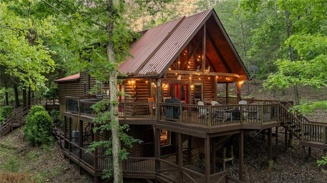 2374 Woodring Branch Rd, Chatsworth, GA 30705 - rear view of property with a wooden deck, stairway, log exterior, and metal roof