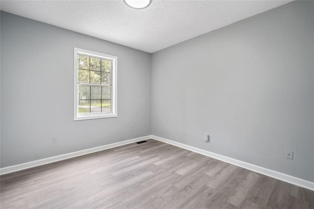 3232 Valley View St, Powder Springs, GA 30127 - unfurnished room with wood finished floors and a textured ceiling