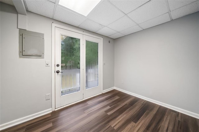 3232 Valley View St, Powder Springs, GA 30127 - doorway featuring a paneled ceiling, dark wood-style flooring, and electric panel