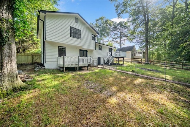 3232 Valley View St, Powder Springs, GA 30127 - rear view of house featuring a deck and a fenced backyard