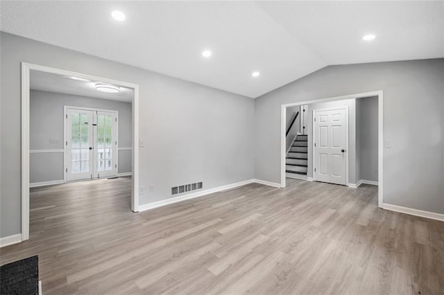 3232 Valley View St, Powder Springs, GA 30127 - unfurnished room with stairway, light wood-type flooring, lofted ceiling, and recessed lighting