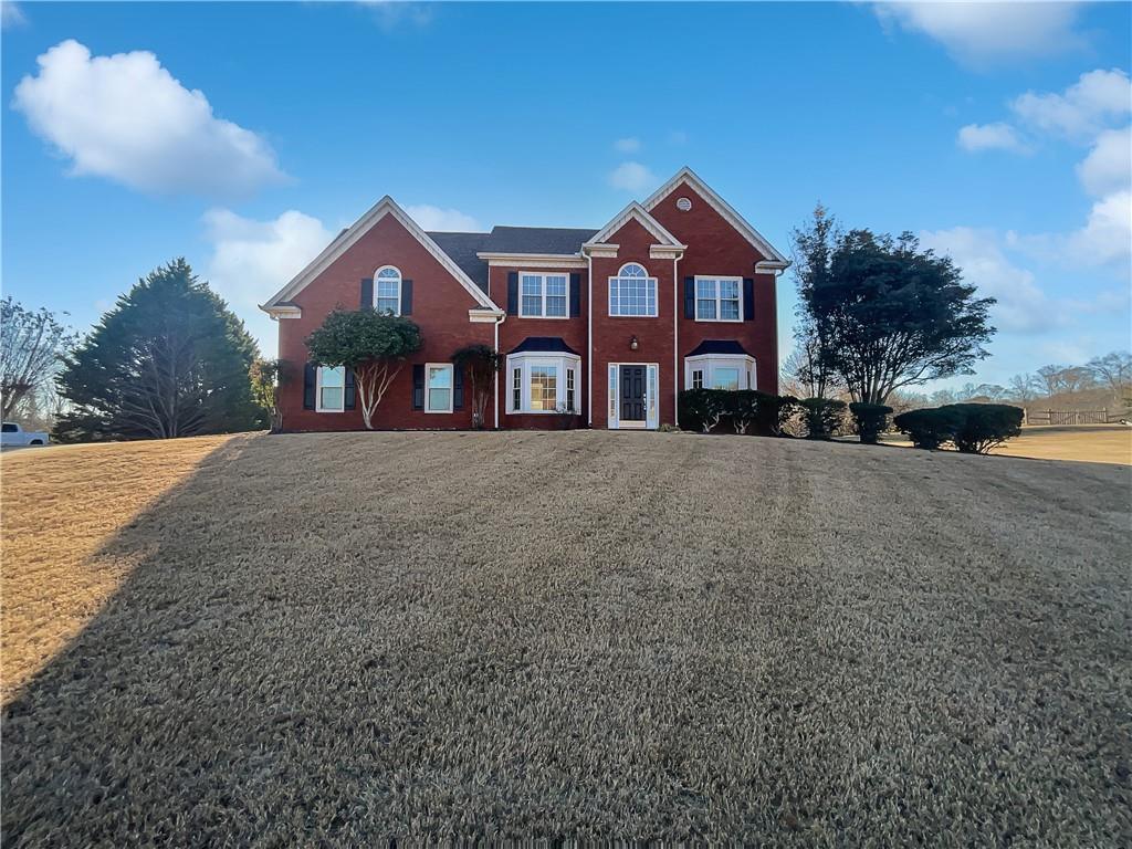 view of front of house with a front yard