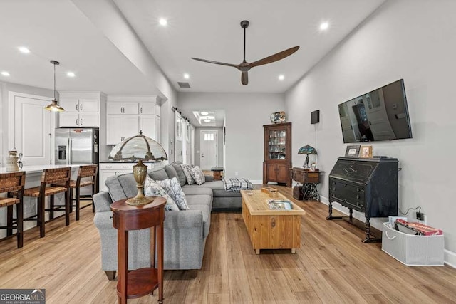 123 Rabun Ct, Hoschton, GA 30548 - living room featuring recessed lighting, ceiling fan, and light wood-type flooring