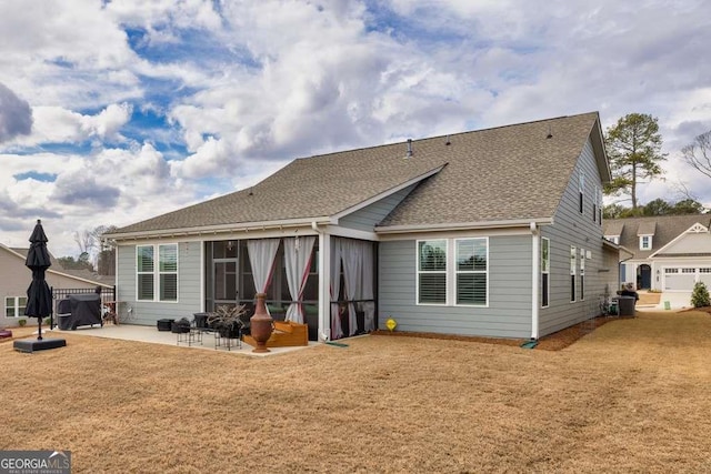 123 Rabun Ct, Hoschton, GA 30548 - back of property featuring a patio, a yard, and a shingled roof