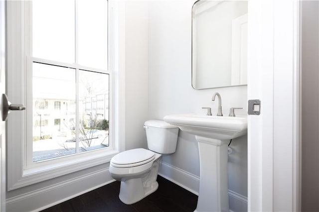 bathroom with toilet and sink