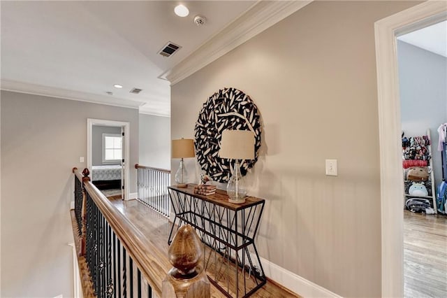 10020 Normandy Ln, Suwanee, GA 30024 - hallway featuring ornamental molding, wood finished floors, recessed lighting, and an upstairs landing