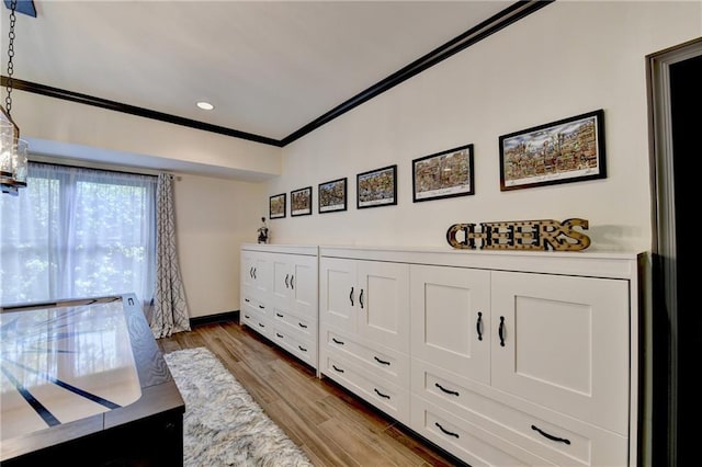 10020 Normandy Ln, Suwanee, GA 30024 - detailed view of wood finished floors, ornamental molding, and recessed lighting