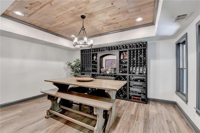 10020 Normandy Ln, Suwanee, GA 30024 - wine area featuring a raised ceiling, wood ceiling, light wood-type flooring, a chandelier, and recessed lighting