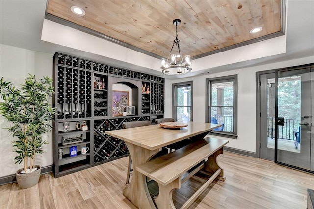 10020 Normandy Ln, Suwanee, GA 30024 - dining space with a raised ceiling, wooden ceiling, light wood-style flooring, a chandelier, and recessed lighting