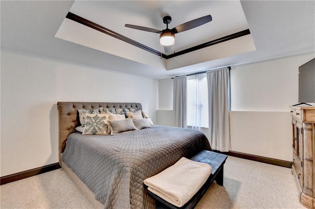 10020 Normandy Ln, Suwanee, GA 30024 - carpeted bedroom with a raised ceiling, ceiling fan, and crown molding