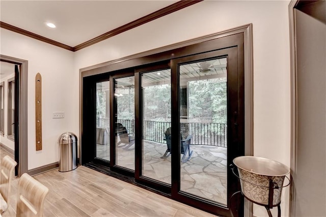10020 Normandy Ln, Suwanee, GA 30024 - doorway with crown molding and light wood finished floors