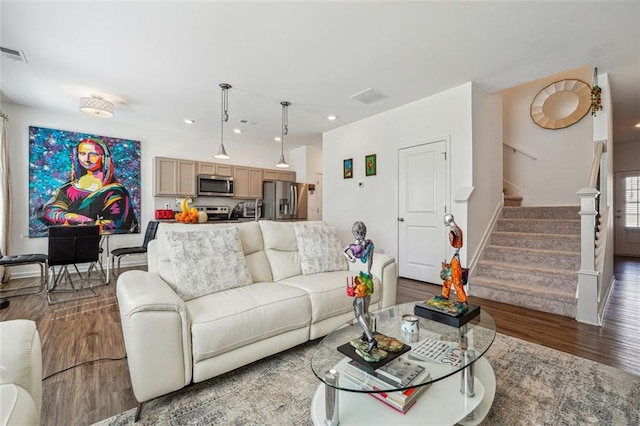 living room with dark hardwood / wood-style floors