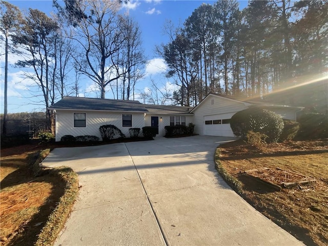 single story home featuring a garage