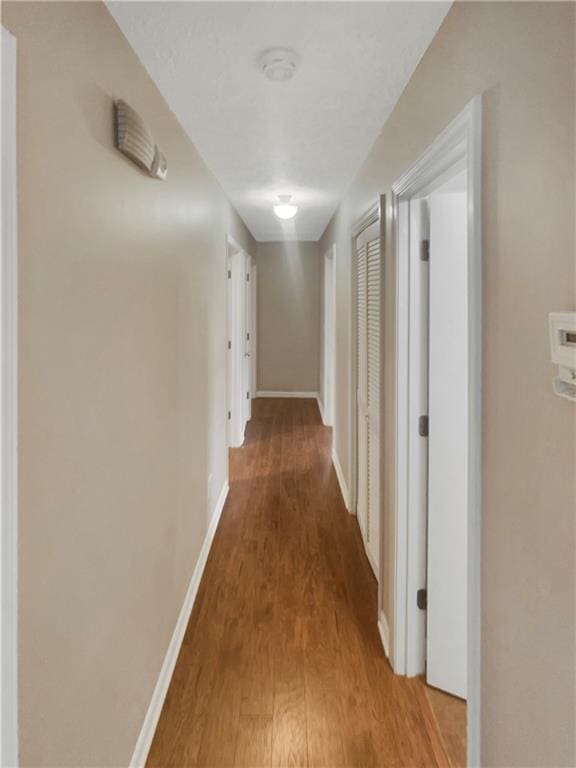 hall featuring hardwood / wood-style flooring