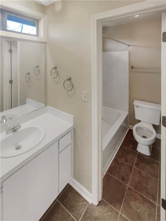 full bathroom featuring shower / tub combination, vanity, toilet, and tile patterned flooring