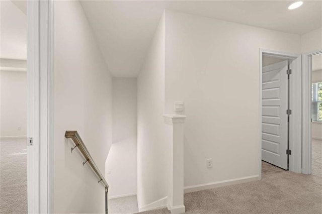 stairway with recessed lighting, carpet, and baseboards