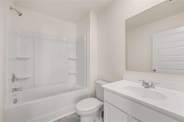 bathroom with shower / bathtub combination, vanity, and toilet